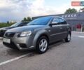 Серый Киа Рио, объемом двигателя 1.4 л и пробегом 226 тыс. км за 5200 $, фото 1 на Automoto.ua