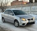 Сірий Кіа Ріо, об'ємом двигуна 1.4 л та пробігом 225 тис. км за 5241 $, фото 1 на Automoto.ua