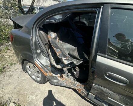 Серый Киа Рио, объемом двигателя 1.4 л и пробегом 244 тыс. км за 1499 $, фото 9 на Automoto.ua