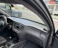 Сірий Кіа Ріо, об'ємом двигуна 1.4 л та пробігом 195 тис. км за 5250 $, фото 10 на Automoto.ua
