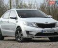 Серый Киа Рио, объемом двигателя 1.4 л и пробегом 247 тыс. км за 5800 $, фото 1 на Automoto.ua