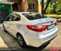 Серый Киа Рио, объемом двигателя 1.4 л и пробегом 230 тыс. км за 5999 $, фото 3 на Automoto.ua