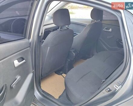 Серый Киа Рио, объемом двигателя 1.4 л и пробегом 225 тыс. км за 5200 $, фото 13 на Automoto.ua