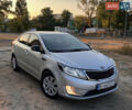 Серый Киа Рио, объемом двигателя 1.6 л и пробегом 300 тыс. км за 5300 $, фото 1 на Automoto.ua