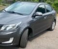 Серый Киа Рио, объемом двигателя 1.6 л и пробегом 249 тыс. км за 8600 $, фото 2 на Automoto.ua