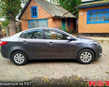 Серый Киа Рио, объемом двигателя 1.6 л и пробегом 189 тыс. км за 7299 $, фото 2 на Automoto.ua