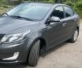Сірий Кіа Ріо, об'ємом двигуна 1.6 л та пробігом 249 тис. км за 8604 $, фото 1 на Automoto.ua