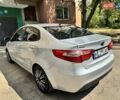 Серый Киа Рио, объемом двигателя 1.4 л и пробегом 230 тыс. км за 5999 $, фото 5 на Automoto.ua
