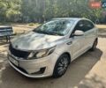 Серый Киа Рио, объемом двигателя 1.4 л и пробегом 230 тыс. км за 5999 $, фото 1 на Automoto.ua