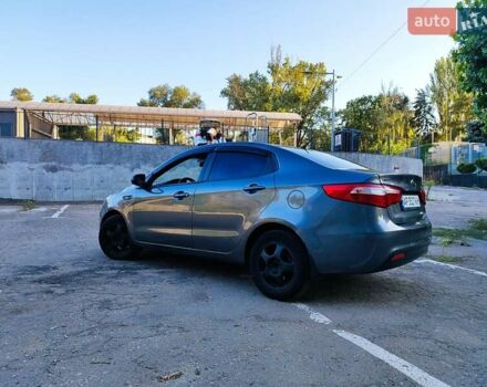 Серый Киа Рио, объемом двигателя 1.4 л и пробегом 225 тыс. км за 5200 $, фото 2 на Automoto.ua