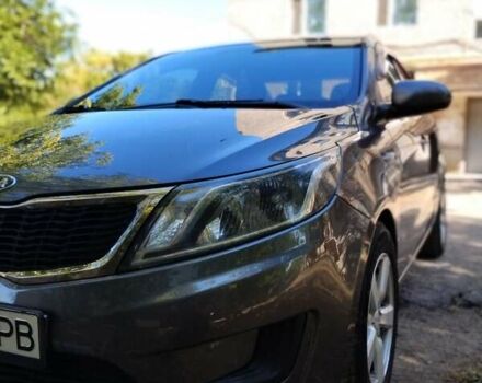 Серый Киа Рио, объемом двигателя 1.4 л и пробегом 200 тыс. км за 7000 $, фото 1 на Automoto.ua