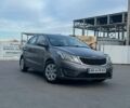 Серый Киа Рио, объемом двигателя 1.4 л и пробегом 216 тыс. км за 7750 $, фото 1 на Automoto.ua