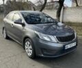 Сірий Кіа Ріо, об'ємом двигуна 1.4 л та пробігом 170 тис. км за 5999 $, фото 3 на Automoto.ua