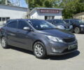 Сірий Кіа Ріо, об'ємом двигуна 1.6 л та пробігом 116 тис. км за 7900 $, фото 1 на Automoto.ua