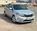 Сірий Кіа Ріо, об'ємом двигуна 1.6 л та пробігом 128 тис. км за 9350 $, фото 1 на Automoto.ua