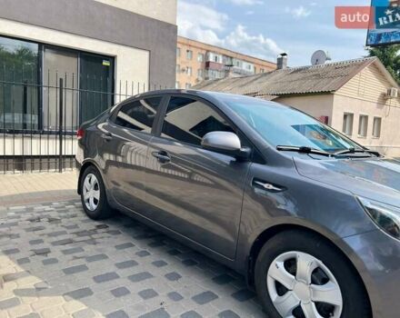 Серый Киа Рио, объемом двигателя 1.4 л и пробегом 254 тыс. км за 6500 $, фото 2 на Automoto.ua