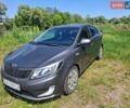 Серый Киа Рио, объемом двигателя 1.4 л и пробегом 235 тыс. км за 5600 $, фото 1 на Automoto.ua