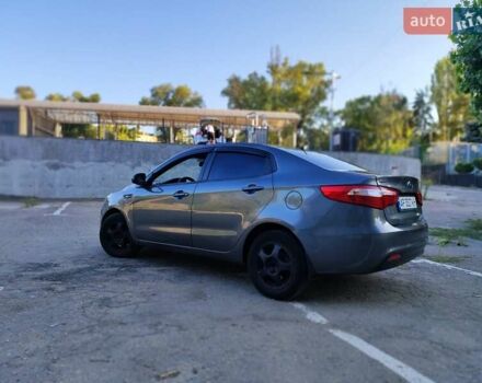 Серый Киа Рио, объемом двигателя 1.4 л и пробегом 225 тыс. км за 5200 $, фото 3 на Automoto.ua