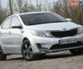 Серый Киа Рио, объемом двигателя 1.4 л и пробегом 247 тыс. км за 5800 $, фото 1 на Automoto.ua