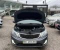 Сірий Кіа Ріо, об'ємом двигуна 1.4 л та пробігом 190 тис. км за 7500 $, фото 8 на Automoto.ua