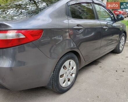Серый Киа Рио, объемом двигателя 1.4 л и пробегом 242 тыс. км за 5750 $, фото 3 на Automoto.ua