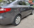 Серый Киа Рио, объемом двигателя 1.4 л и пробегом 242 тыс. км за 5750 $, фото 3 на Automoto.ua