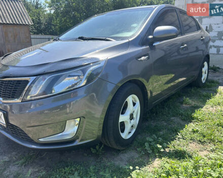 Серый Киа Рио, объемом двигателя 1.6 л и пробегом 250 тыс. км за 8299 $, фото 3 на Automoto.ua