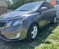 Серый Киа Рио, объемом двигателя 1.6 л и пробегом 250 тыс. км за 8299 $, фото 3 на Automoto.ua
