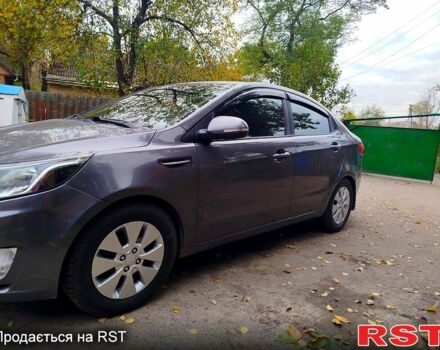 Серый Киа Рио, объемом двигателя 1.6 л и пробегом 189 тыс. км за 7299 $, фото 1 на Automoto.ua