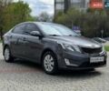 Серый Киа Рио, объемом двигателя 1.59 л и пробегом 206 тыс. км за 7499 $, фото 2 на Automoto.ua