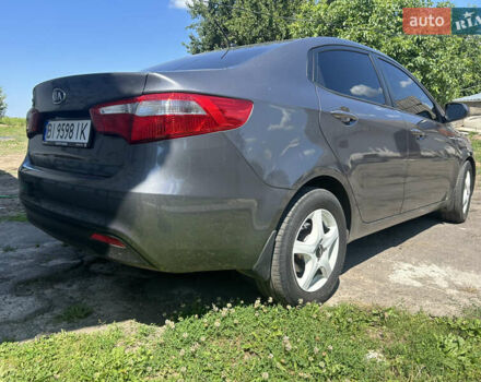 Серый Киа Рио, объемом двигателя 1.6 л и пробегом 250 тыс. км за 6999 $, фото 5 на Automoto.ua