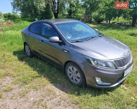 Серый Киа Рио, объемом двигателя 1.4 л и пробегом 235 тыс. км за 5600 $, фото 1 на Automoto.ua