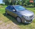 Серый Киа Рио, объемом двигателя 1.4 л и пробегом 235 тыс. км за 5600 $, фото 1 на Automoto.ua