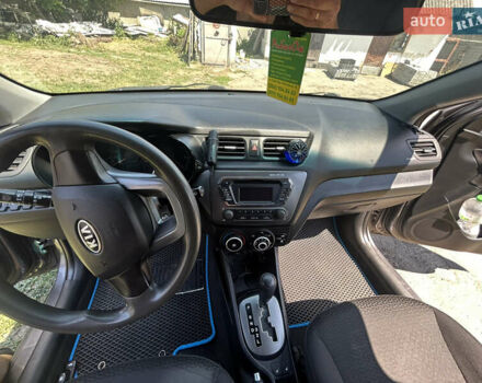 Серый Киа Рио, объемом двигателя 1.6 л и пробегом 250 тыс. км за 6999 $, фото 12 на Automoto.ua