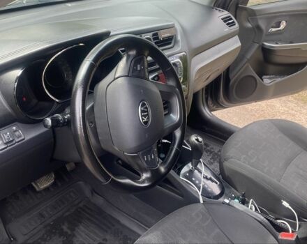 Сірий Кіа Ріо, об'ємом двигуна 1.6 л та пробігом 249 тис. км за 8604 $, фото 7 на Automoto.ua
