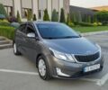 Сірий Кіа Ріо, об'ємом двигуна 2 л та пробігом 223 тис. км за 7750 $, фото 1 на Automoto.ua