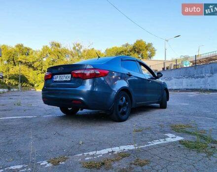 Серый Киа Рио, объемом двигателя 1.4 л и пробегом 225 тыс. км за 5200 $, фото 5 на Automoto.ua