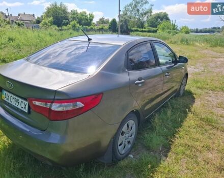 Серый Киа Рио, объемом двигателя 1.4 л и пробегом 235 тыс. км за 5600 $, фото 7 на Automoto.ua