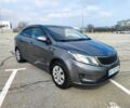 Серый Киа Рио, объемом двигателя 1.4 л и пробегом 260 тыс. км за 5000 $, фото 1 на Automoto.ua