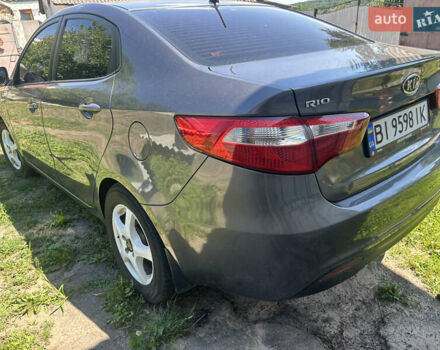Серый Киа Рио, объемом двигателя 1.6 л и пробегом 250 тыс. км за 8299 $, фото 4 на Automoto.ua