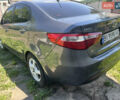 Серый Киа Рио, объемом двигателя 1.6 л и пробегом 250 тыс. км за 8299 $, фото 4 на Automoto.ua