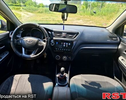 Серый Киа Рио, объемом двигателя 1.4 л и пробегом 235 тыс. км за 5600 $, фото 7 на Automoto.ua