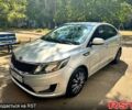 Серый Киа Рио, объемом двигателя 1.4 л и пробегом 230 тыс. км за 5999 $, фото 1 на Automoto.ua