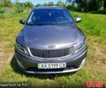 Серый Киа Рио, объемом двигателя 1.4 л и пробегом 235 тыс. км за 5600 $, фото 3 на Automoto.ua