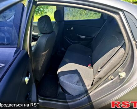 Серый Киа Рио, объемом двигателя 1.4 л и пробегом 235 тыс. км за 5600 $, фото 8 на Automoto.ua