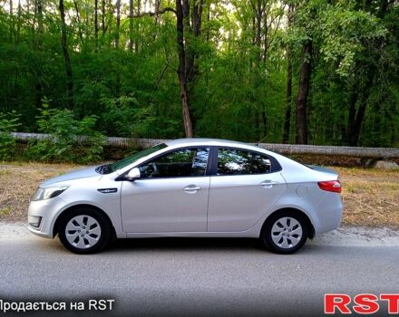 Сірий Кіа Ріо, об'ємом двигуна 1.4 л та пробігом 230 тис. км за 5750 $, фото 3 на Automoto.ua