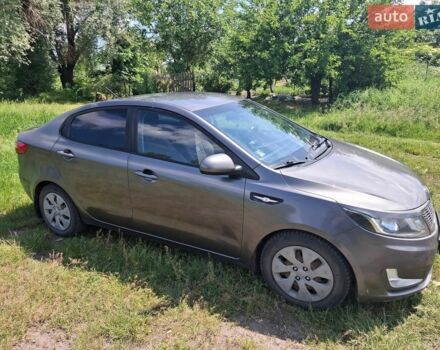Серый Киа Рио, объемом двигателя 1.4 л и пробегом 235 тыс. км за 5600 $, фото 4 на Automoto.ua