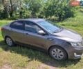 Серый Киа Рио, объемом двигателя 1.4 л и пробегом 235 тыс. км за 5600 $, фото 4 на Automoto.ua
