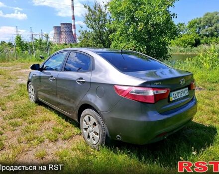 Серый Киа Рио, объемом двигателя 1.4 л и пробегом 235 тыс. км за 5600 $, фото 4 на Automoto.ua