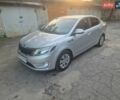 Серый Киа Рио, объемом двигателя 1.6 л и пробегом 150 тыс. км за 7950 $, фото 1 на Automoto.ua